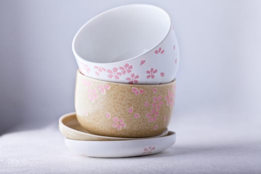 Empty ceramic bowls on a white background