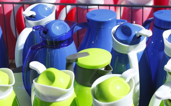 Colorful Coffee Cans in a Shopping Street