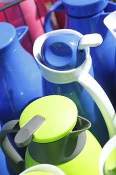 Colorful Coffee Cans in a Shopping Street