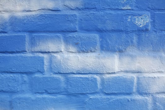 Blue and white Bricks in a Wall