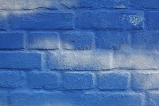 Blue and white Bricks in a Wall
