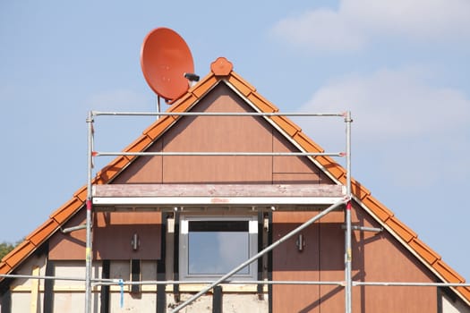 construction site on a new building house roof