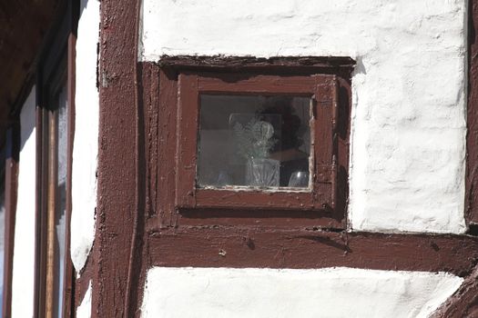 window on a half-timbered house wall