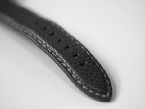 BLACK AND WHITE PHOTO OF LEATHER WATCH STRAP