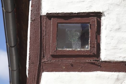 window on a half-timbered house wall