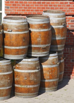 brown staked wooden staked barrels