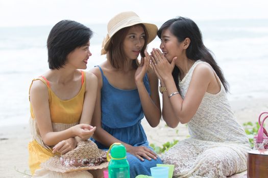 portrait group of young beautiful woman friend gossip whispering talking about secret story 