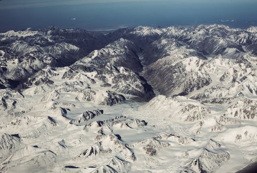 Top of mountains. Panorama from an airplane