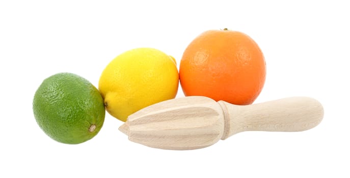 Lime, lemon and orange fruit with wooden citrus reamer, isolated on a white background