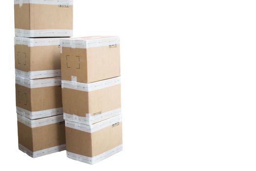 Deliveries boxes in piles on a white background