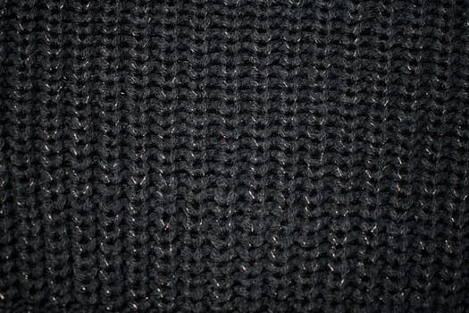 A black sweater close up textile product