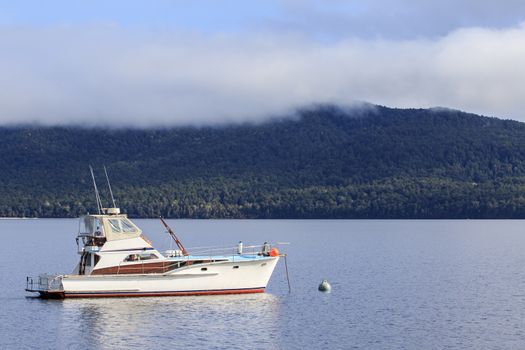 yachting boat in te anau lake fiord land national park new zealand important traveling destination