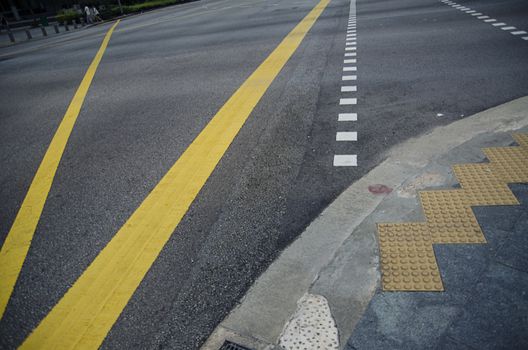 Background with tire marks on road closeup photo