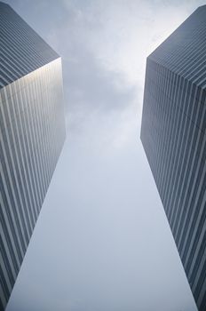 Modern transperent background perspective view to steel blue glass high rise building skyscrapers, industrial architecture