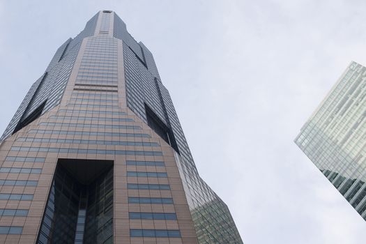 Modern transperent background perspective view to steel blue glass high rise building skyscrapers, industrial architecture