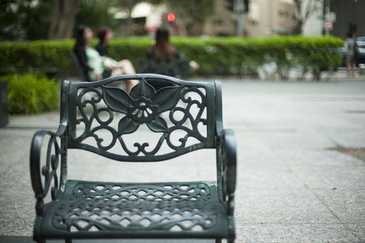 Vintage black old metal chair with floral ornament