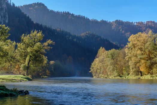 The intense colors of autumn morning in the mountains