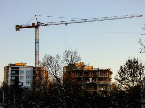 Crane standing in Construction Site of new Apartments in VIlnius City, Lithuania