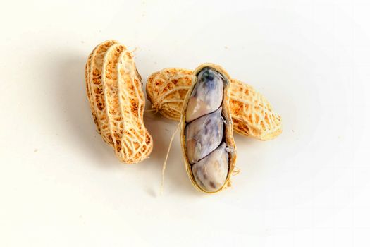 Boiled peanuts on white background