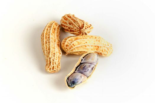 Boiled peanuts on white background