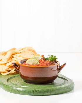 Fresh made salsa served with crispy tortilla chips.