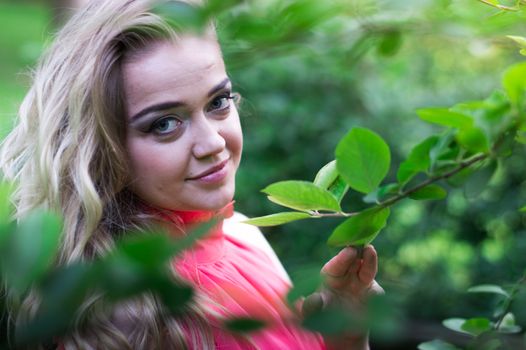 beautiful girl with blonde long hair in the Park