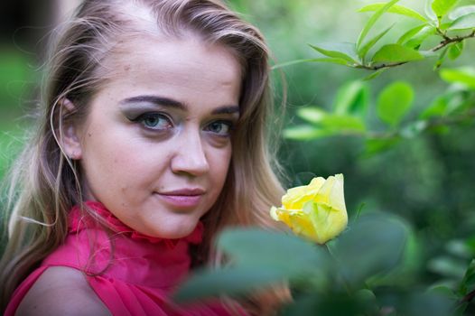 beautiful girl with blonde long hair in the Park