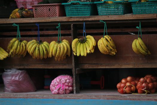 Banana hang in row for sell in market
