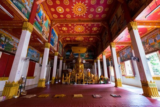 Painting on the wall in a temple, Vientiane, Lao