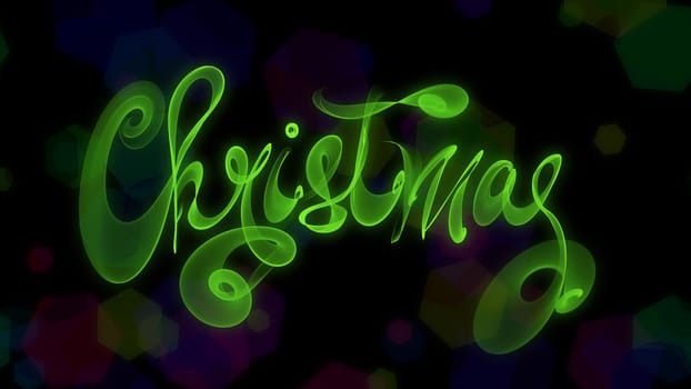 Christmas word lettering written with green fire flame or smoke on blurred bokeh background.
