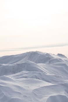 The snow isolated on white background, snow pile