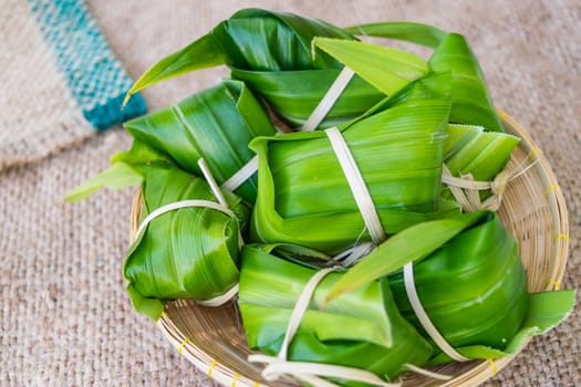 Traditional Thai food style, Thai dessert made from banana and glutinous rice, wrap with pandan (Khao Tom Mat)