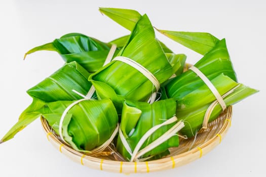 Traditional Thai food style, Thai dessert made from banana and glutinous rice, wrap with pandan (Khao Tom Mat)