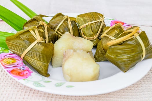 Traditional Thai food style, Thai dessert made from banana and glutinous rice, wrap with pandan (Khao Tom Mat)