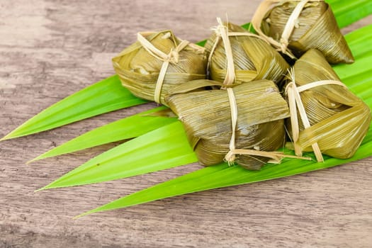 Traditional Thai food style, Thai dessert made from banana and glutinous rice, wrap with pandan (Khao Tom Mat)