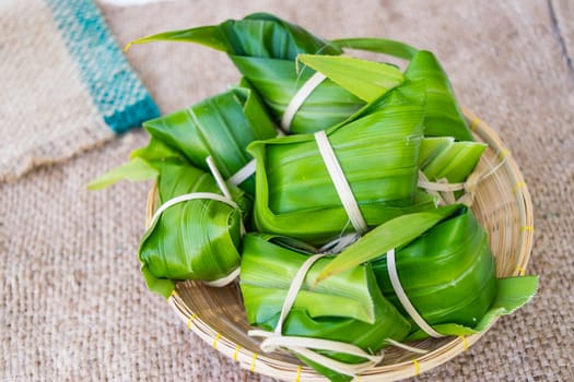 Traditional Thai food style, Thai dessert made from banana and glutinous rice, wrap with pandan (Khao Tom Mat)