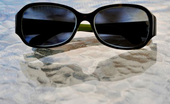 Sunglasses on vacation at the beach.