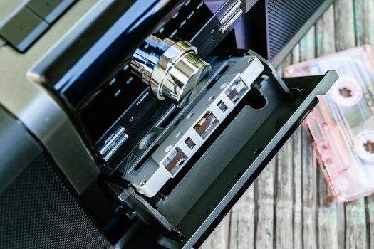 Dusty old radio with one cassette player