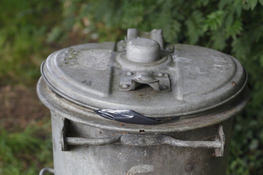 Top of a metal Waste Bin
