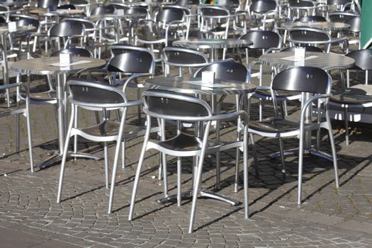 Silver metal chairs and table