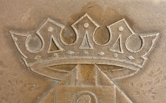 ground mark crown, relief on pedestrian's way