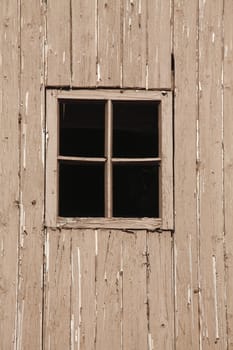 brown wooden house wall with wooden window