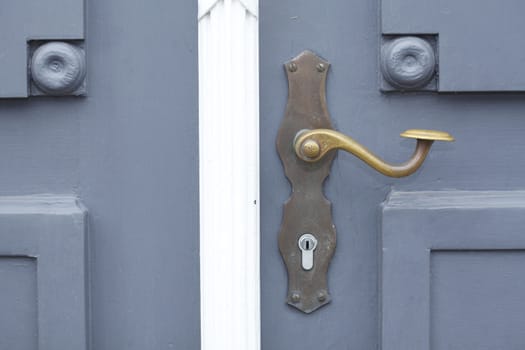 old wooden door with metal lock