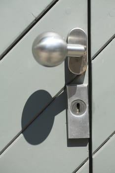 old wooden door with metal lock