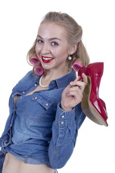 Young beautiful girl in pin-up style on a white background