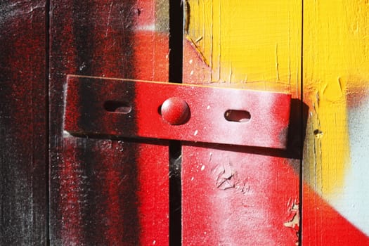 red-orange painted wooden boards