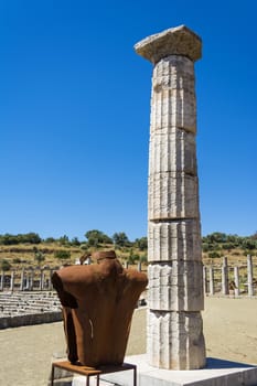 Metallic headless statue in the ancient Greek city of Messinia at Peloponnese, Greece