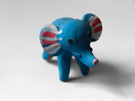 COLOR PHOTO OF BLUE ELEPHANT TOY