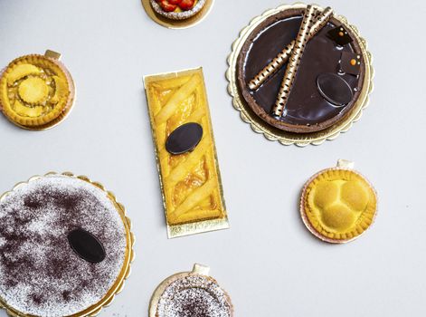 overhead shot of different sweets, pies and baked specialities.