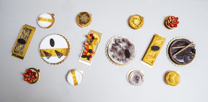 overhead shot of different sweets, pies and baked specialities.